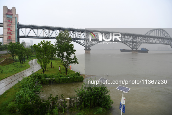 The Jiujiang Yangtze River Bridge is being seen at high water level in Jiujiang, China, on June 28, 2024. The water level at Jiujiang Statio...