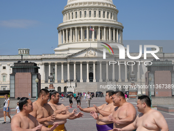 Several Japanese sumo wrestlers are participating in an exhibition event in Washington, DC, on June 28, 2024.  (