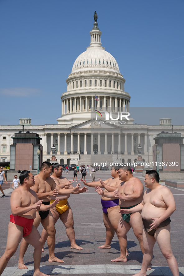 Several Japanese sumo wrestlers are participating in an exhibition event in Washington, DC, on June 28, 2024.  