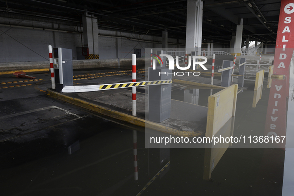 I am viewing the outside of a flooded shopping mall in Ecatepec, State of Mexico, due to the rains during the last few days. 