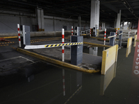 I am viewing the outside of a flooded shopping mall in Ecatepec, State of Mexico, due to the rains during the last few days. (