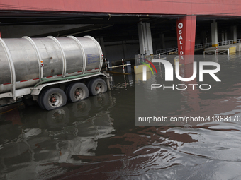 I am viewing the outside of a flooded shopping mall in Ecatepec, State of Mexico, due to the rains during the last few days. (