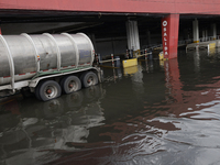 I am viewing the outside of a flooded shopping mall in Ecatepec, State of Mexico, due to the rains during the last few days. (