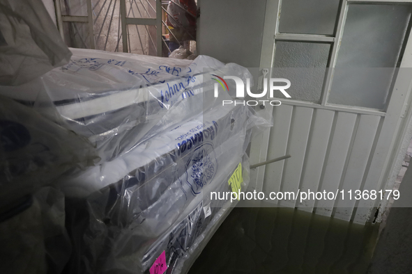 A view inside a house is being affected by flooding in Ecatepec, State of Mexico, as a result of the rains during the last few days. 