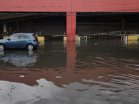 I am viewing the outside of a flooded shopping mall in Ecatepec, State of Mexico, due to the rains during the last few days. (