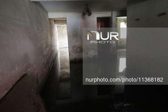 A view inside a house is being affected by flooding in Ecatepec, State of Mexico, as a result of the rains during the last few days. 