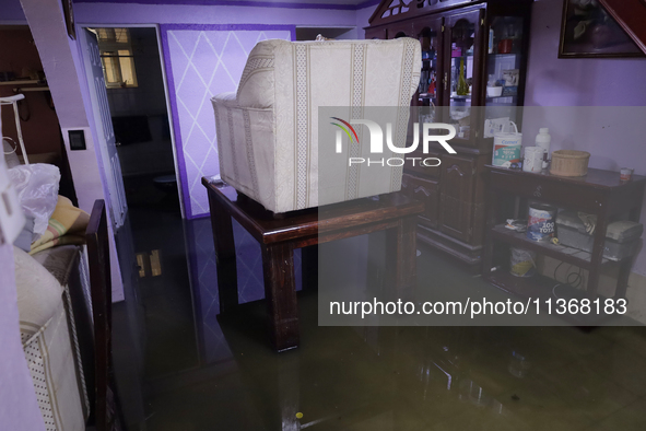 A view inside a house is being affected by flooding in Ecatepec, State of Mexico, as a result of the rains during the last few days. 