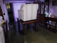 A view inside a house is being affected by flooding in Ecatepec, State of Mexico, as a result of the rains during the last few days. (