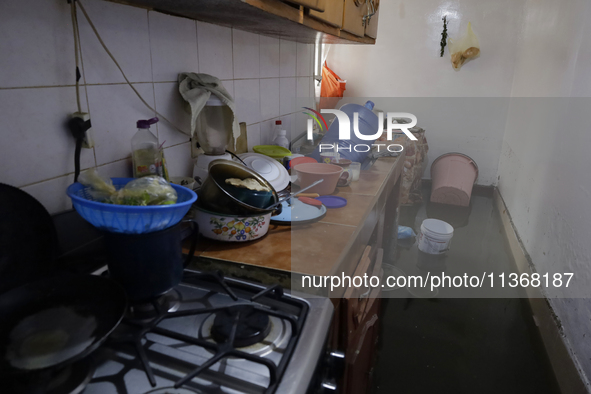 A kitchen of a house is being affected by flooding in Ecatepec, State of Mexico, due to the rains during the last few days. 