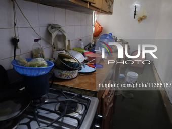 A kitchen of a house is being affected by flooding in Ecatepec, State of Mexico, due to the rains during the last few days. (