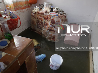 A kitchen of a house is being affected by flooding in Ecatepec, State of Mexico, due to the rains during the last few days. (