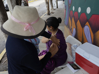 Medical staff are vaccinating people against tetanus and those who were affected after flooding in Ecatepec, State of Mexico, due to the rai...