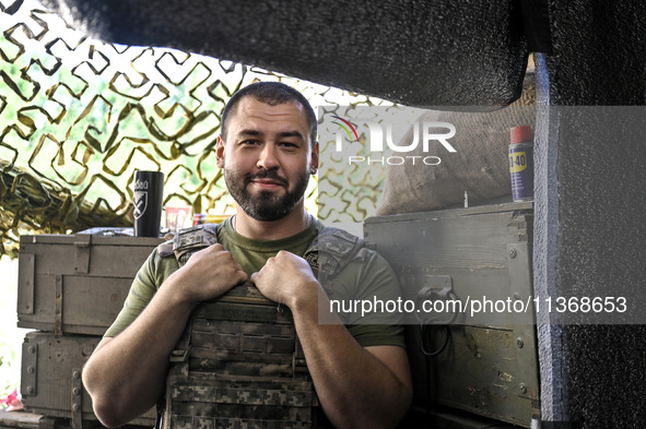 An aerial reconnaissance man of the 148th separate artillery brigade of the Ukrainian Air Assault Forces is posing for a picture in the Done...