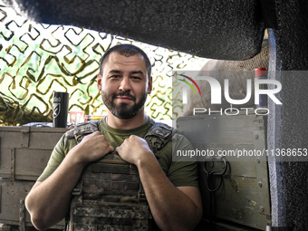 An aerial reconnaissance man of the 148th separate artillery brigade of the Ukrainian Air Assault Forces is posing for a picture in the Done...