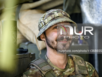 An aerial reconnaissance man of the 148th separate artillery brigade of the Ukrainian Air Assault Forces is posing for a picture in the Done...