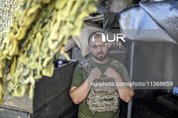 An aerial reconnaissance man of the 148th separate artillery brigade of the Ukrainian Air Assault Forces is posing for a picture in the Done...