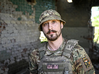 An aerial reconnaissance man of the 148th separate artillery brigade of the Ukrainian Air Assault Forces is posing for a picture in the Done...