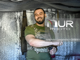 An aerial reconnaissance man of the 148th separate artillery brigade of the Ukrainian Air Assault Forces is posing for a picture in the Done...