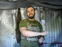 An aerial reconnaissance man of the 148th separate artillery brigade of the Ukrainian Air Assault Forces is posing for a picture in the Done...