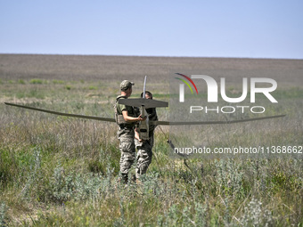 In Donetsk region, Ukraine, on June 13, 2024, aerial reconnaissance men of the 148th separate artillery brigade of the Ukrainian Air Assault...