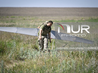 In Donetsk region, Ukraine, on June 13, 2024, aerial reconnaissance men of the 148th separate artillery brigade of the Ukrainian Air Assault...