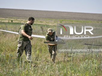 In Donetsk region, Ukraine, on June 13, 2024, aerial reconnaissance men of the 148th separate artillery brigade of the Ukrainian Air Assault...