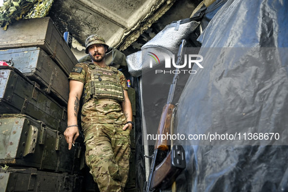 An aerial reconnaissance man of the 148th separate artillery brigade of the Ukrainian Air Assault Forces is having a smoke in Donetsk region...