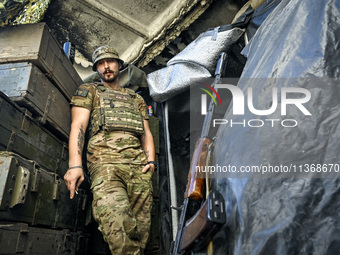 An aerial reconnaissance man of the 148th separate artillery brigade of the Ukrainian Air Assault Forces is having a smoke in Donetsk region...