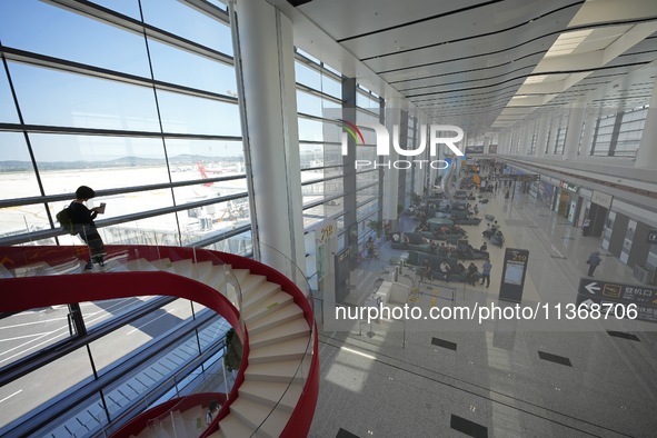 Passengers are waiting for a flight at the T2 terminal of Yantai Penglai International Airport in Yantai, China, on June 28, 2024. 