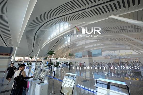 Passengers are waiting for a flight at the T2 terminal of Yantai Penglai International Airport in Yantai, China, on June 28, 2024. 