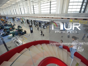 Passengers are waiting for a flight at the T2 terminal of Yantai Penglai International Airport in Yantai, China, on June 28, 2024. (