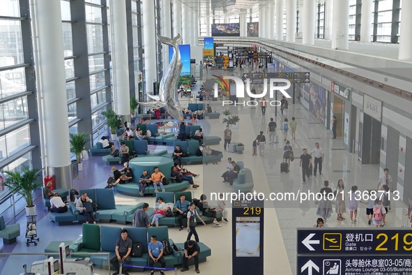 Passengers are waiting for a flight at the T2 terminal of Yantai Penglai International Airport in Yantai, China, on June 28, 2024. 