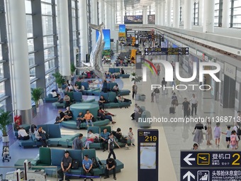 Passengers are waiting for a flight at the T2 terminal of Yantai Penglai International Airport in Yantai, China, on June 28, 2024. (