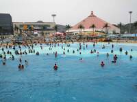 People are playing in the water at Longcheng Happy Water World Scenic spot in Chengde, China, on June 29, 2024. (