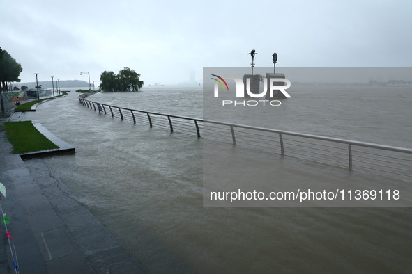 The Nanjing section of the Yangtze River is exceeding the warning water level in Nanjing, China, on June 29, 2024. 