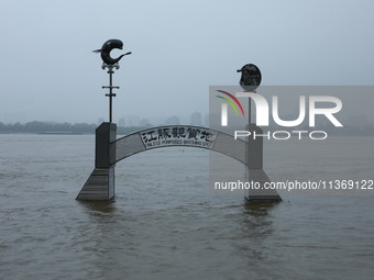 The Nanjing section of the Yangtze River is exceeding the warning water level in Nanjing, China, on June 29, 2024. (