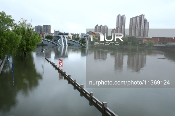 The Nanjing section of the Yangtze River is exceeding the warning water level in Nanjing, China, on June 29, 2024. 