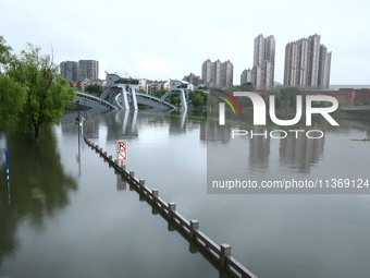 The Nanjing section of the Yangtze River is exceeding the warning water level in Nanjing, China, on June 29, 2024. (