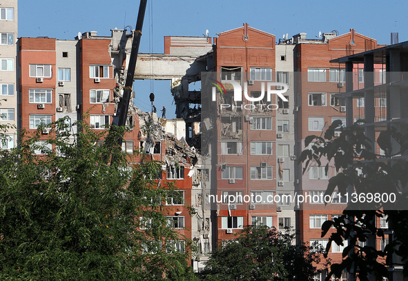 Rescuers are carrying out a search and rescue effort at the apartment block hit by the Russian missile in Dnipro, Ukraine, on June 29, 2024....