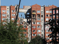 Rescuers are carrying out a search and rescue effort at the apartment block hit by the Russian missile in Dnipro, Ukraine, on June 29, 2024....