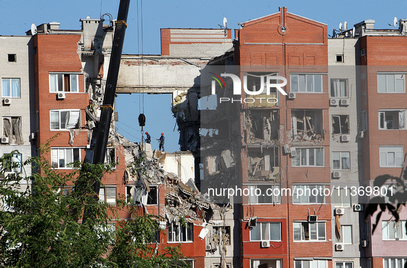 Rescuers are carrying out a search and rescue effort at the apartment block hit by the Russian missile in Dnipro, Ukraine, on June 29, 2024....