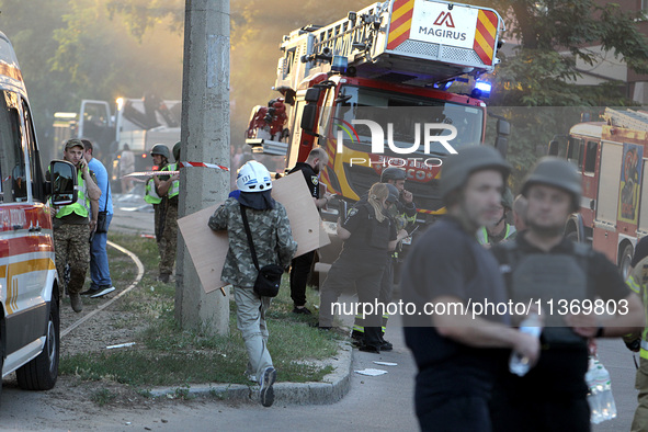 A search and rescue effort is underway at an apartment block hit by a Russian missile in Dnipro, Ukraine, on June 28, 2024. Russian troops a...