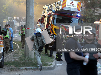 A search and rescue effort is underway at an apartment block hit by a Russian missile in Dnipro, Ukraine, on June 28, 2024. Russian troops a...