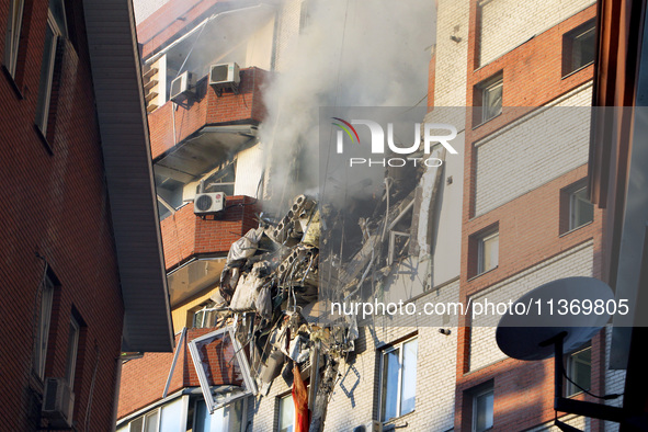 An apartment block is being pictured after it was hit by a Russian missile in Dnipro, Ukraine, on June 28, 2024. Russian troops are attackin...