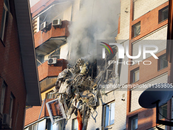 An apartment block is being pictured after it was hit by a Russian missile in Dnipro, Ukraine, on June 28, 2024. Russian troops are attackin...