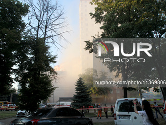 Dust is shrouding an apartment block hit by a Russian missile in Dnipro, Ukraine, on June 28, 2024. Russian troops are attacking a residenti...