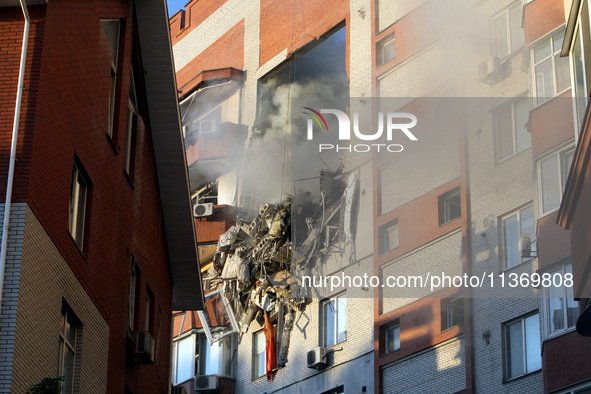 An apartment block is being pictured after it was hit by a Russian missile in Dnipro, Ukraine, on June 28, 2024. Russian troops are attackin...