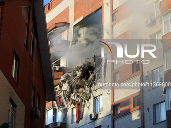 An apartment block is being pictured after it was hit by a Russian missile in Dnipro, Ukraine, on June 28, 2024. Russian troops are attackin...