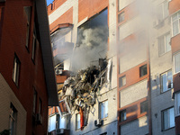 An apartment block is being pictured after it was hit by a Russian missile in Dnipro, Ukraine, on June 28, 2024. Russian troops are attackin...