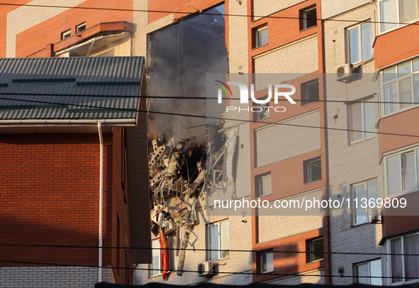 An apartment block is being pictured after it was hit by a Russian missile in Dnipro, Ukraine, on June 28, 2024. Russian troops are attackin...